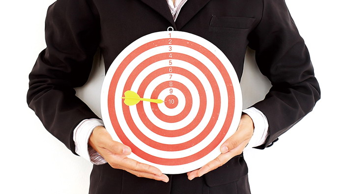 White collar holding darts and bullseye PPT background picture