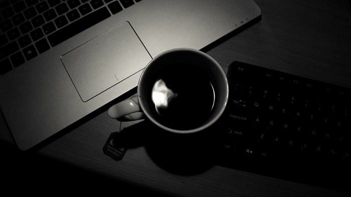 Black notebook coffee cup keyboard PPT background picture