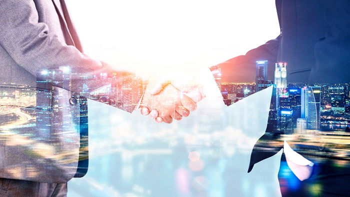 Business people shaking hands PPT background picture